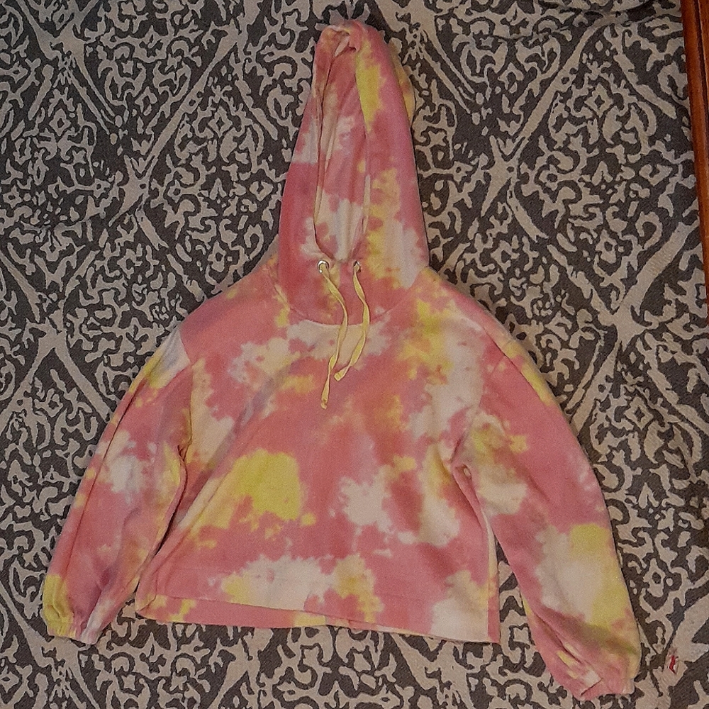 I am selling a medium size white yellow and pink stitch in Pine sweatshirt